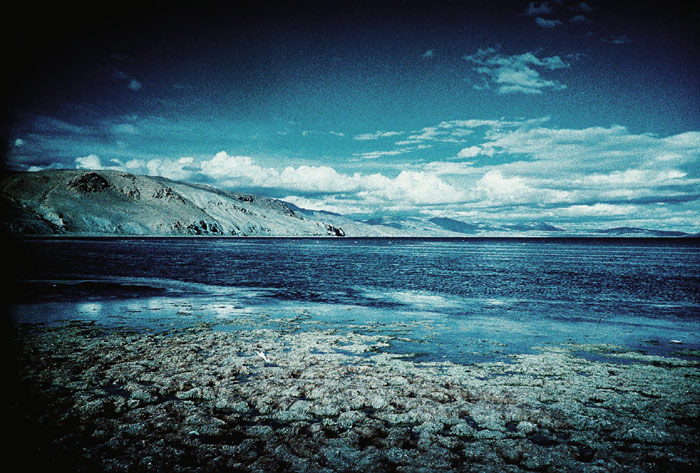 Lake Manasarovar shimmering below the plateau